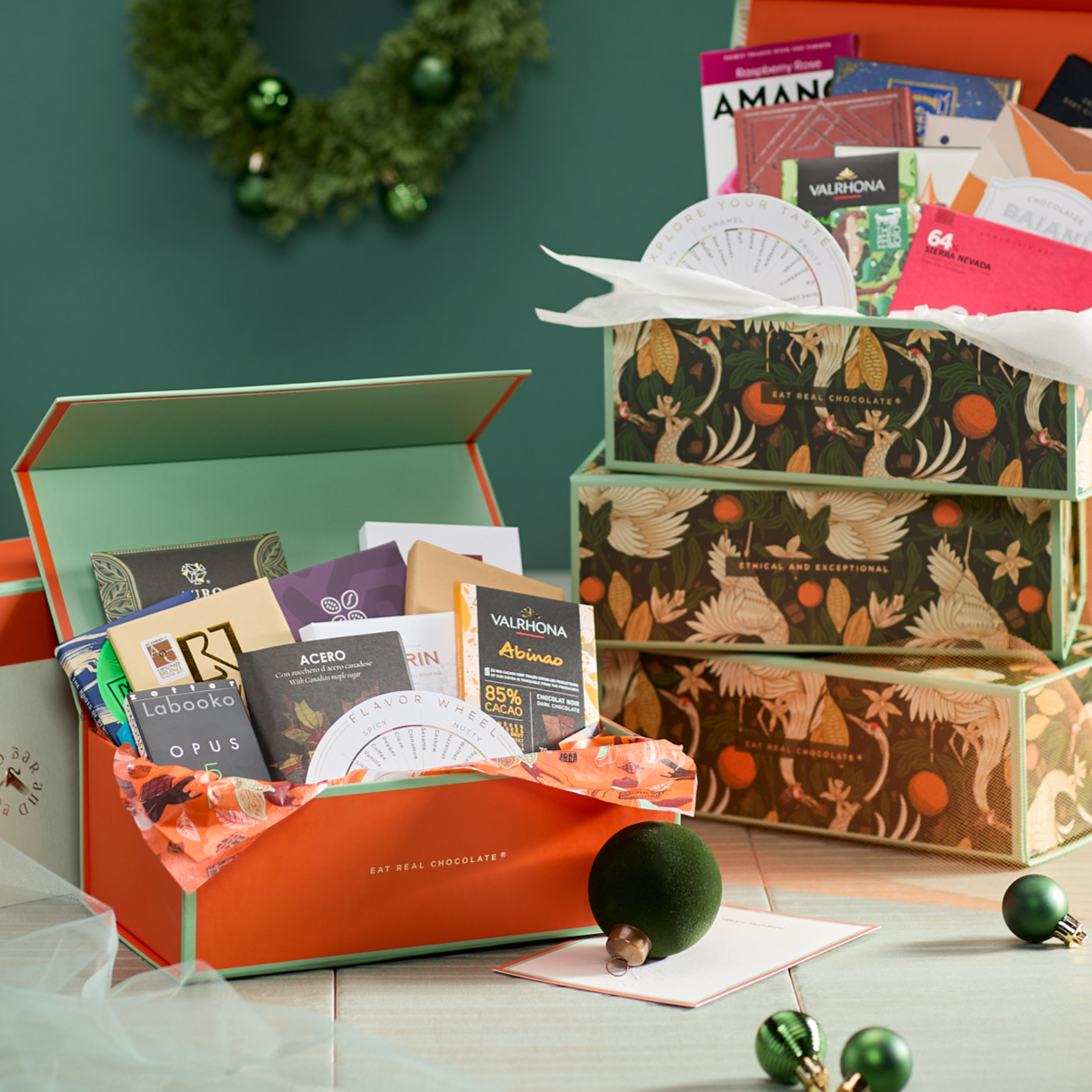 Open orange Chocolate Bars of the World gift box with Valrhona chocolates