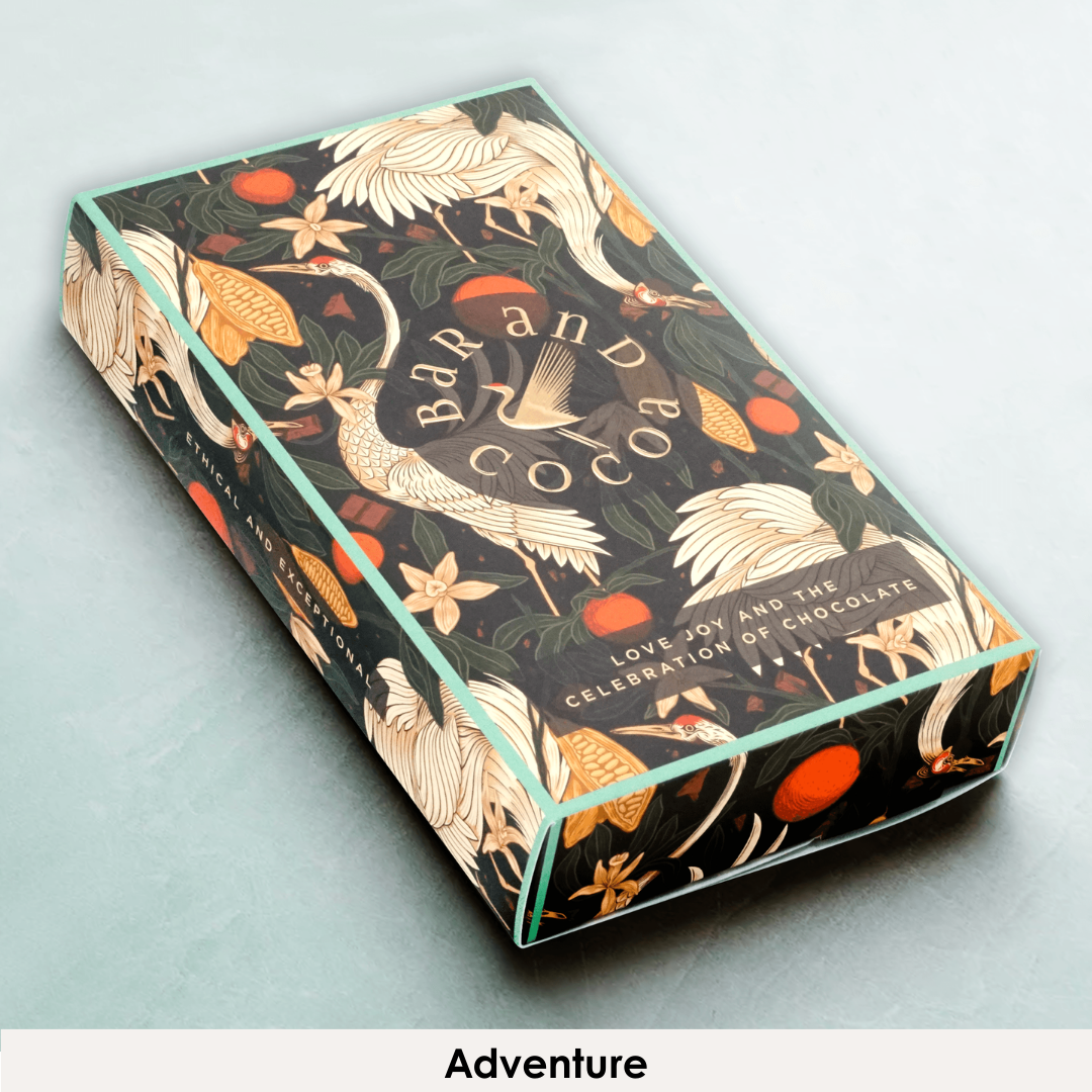 Discover Chocolate Club box with gold foil cranes and cocoa pods