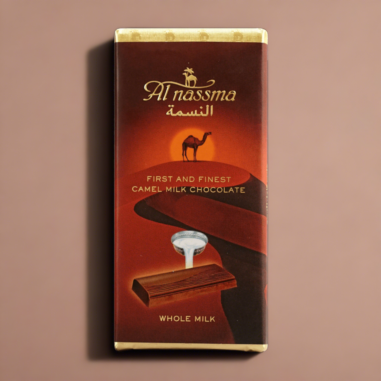 Al Nassma camel milk chocolate bar with gold lettering and camel sunset wrapper