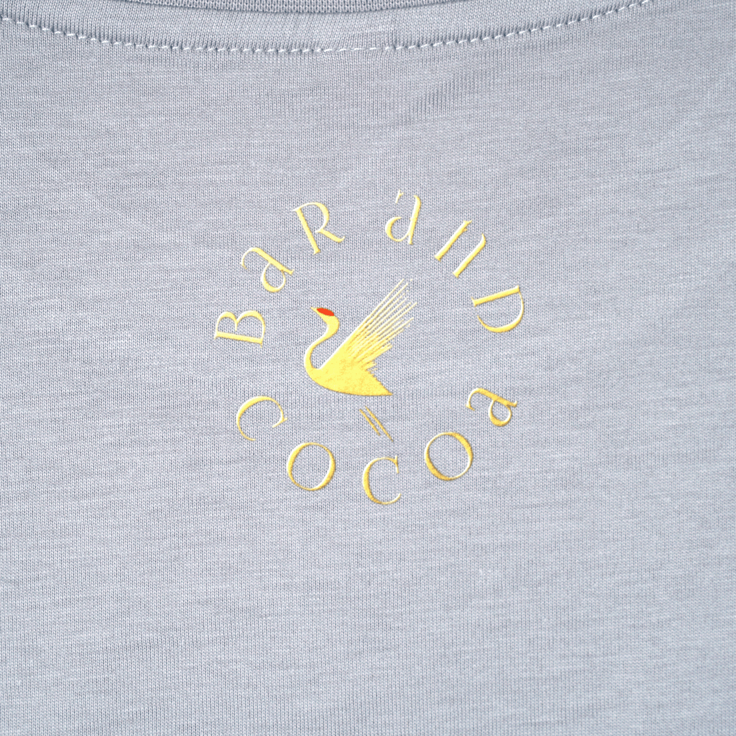 Gray Find Your Inner Piece Tee with gold bar and cocoa swan logo