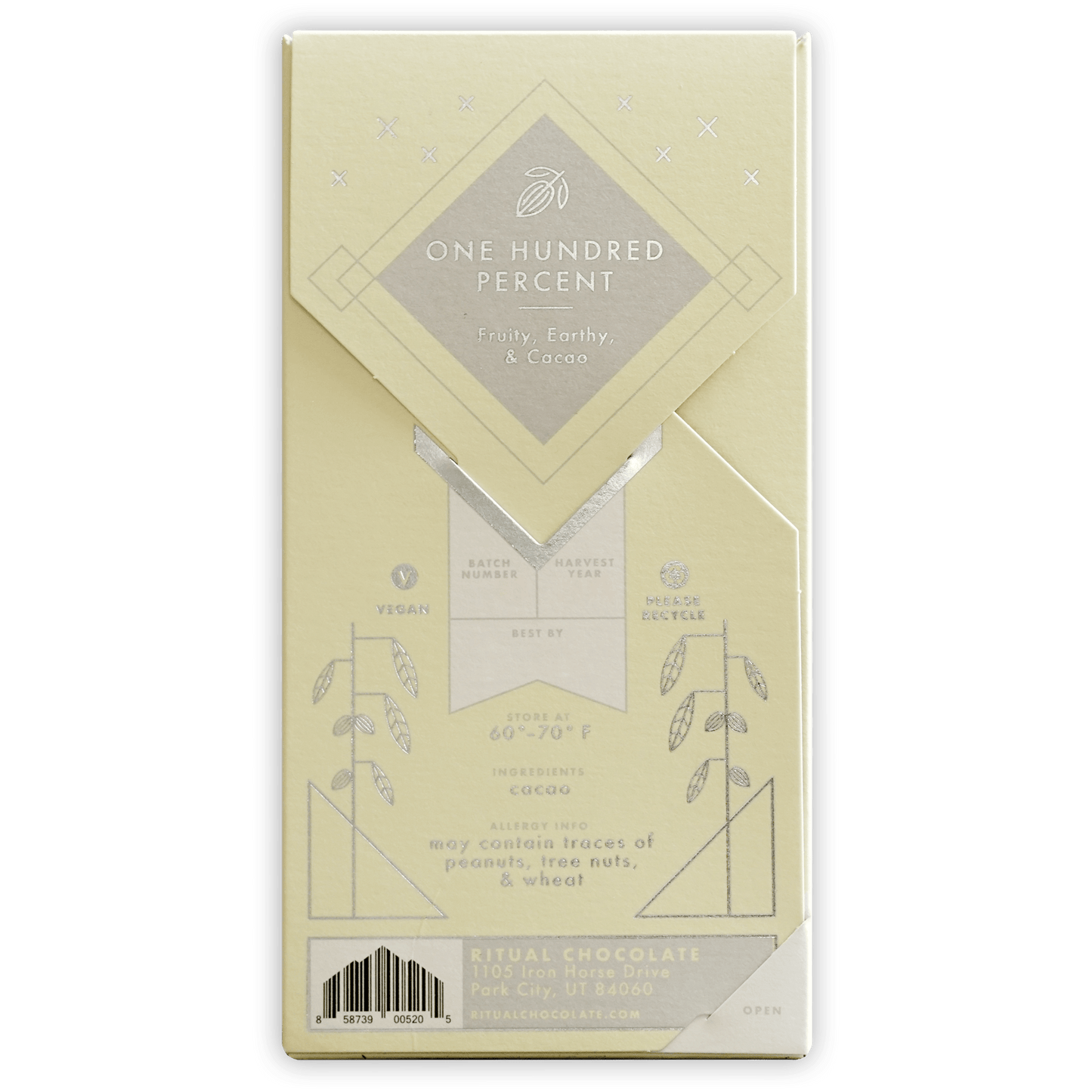 Ritual One Hundred Percent pale yellow chocolate bar wrapper with silver foil and botanical illustrations