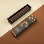 Amedei Chuao Torrone soft nougat in sleek black box with hazelnut fruit art