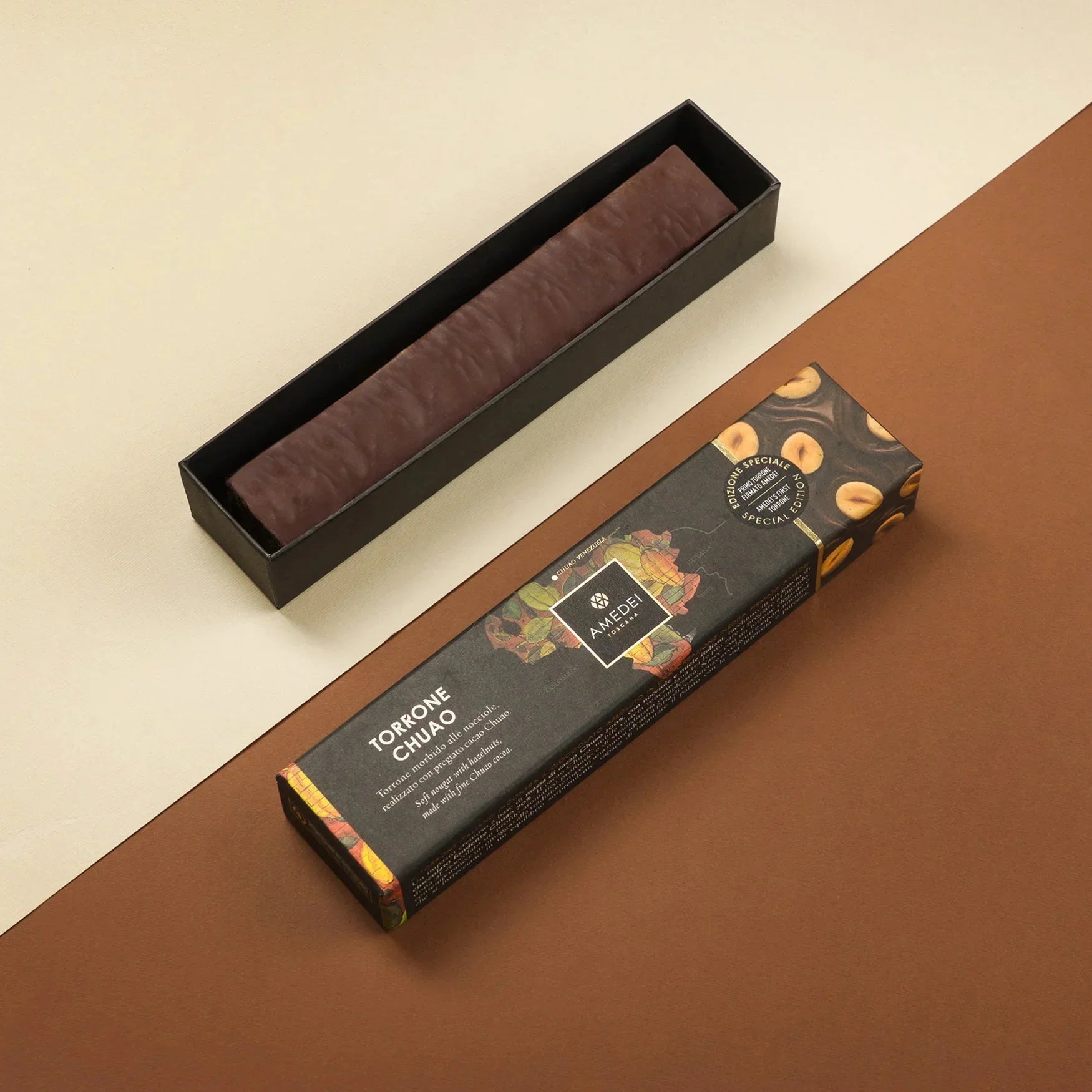 Amedei Chuao Torrone soft nougat in sleek black box with hazelnut fruit art