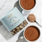 French Broad Dark Hot Chocolate Mix in light blue brown cylinder with gold leaf