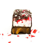 Mayana Chocolate Mini Peppermint Bar with layered cream, red swirls, caramel, candy cane topping