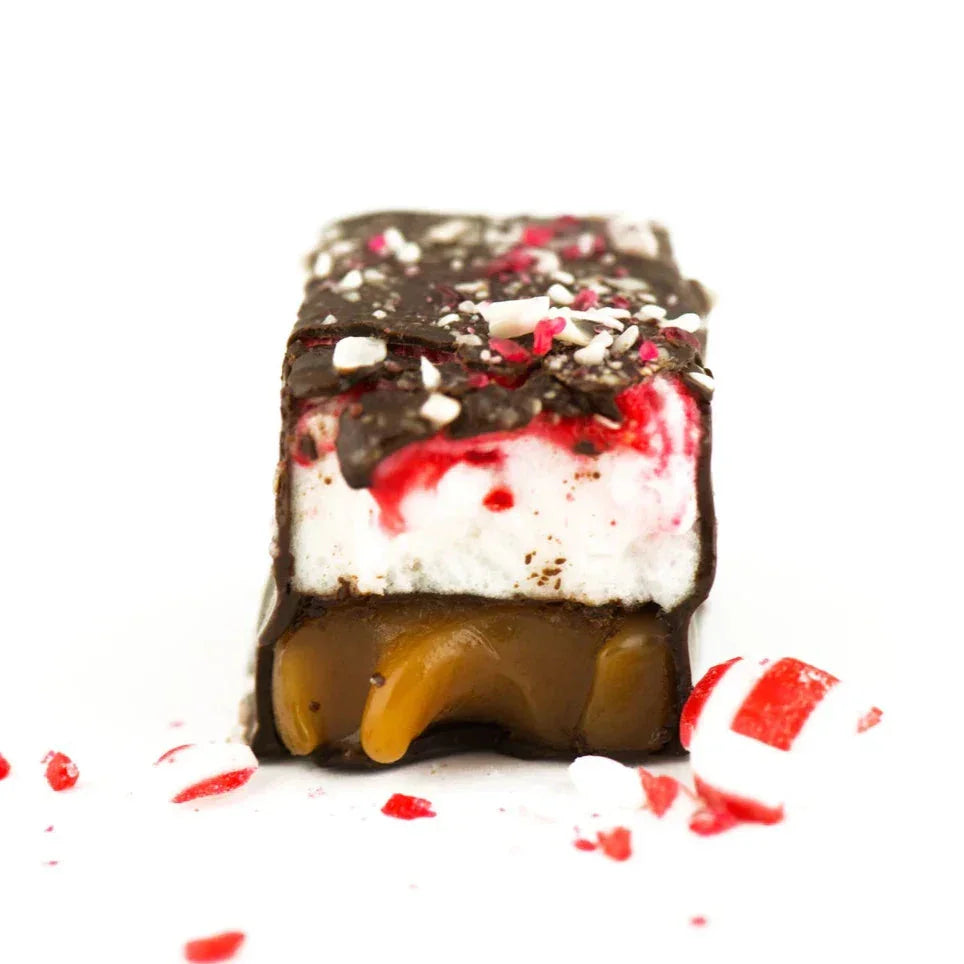 Mayana Chocolate Mini Peppermint Bar with layered cream, red swirls, caramel, candy cane topping