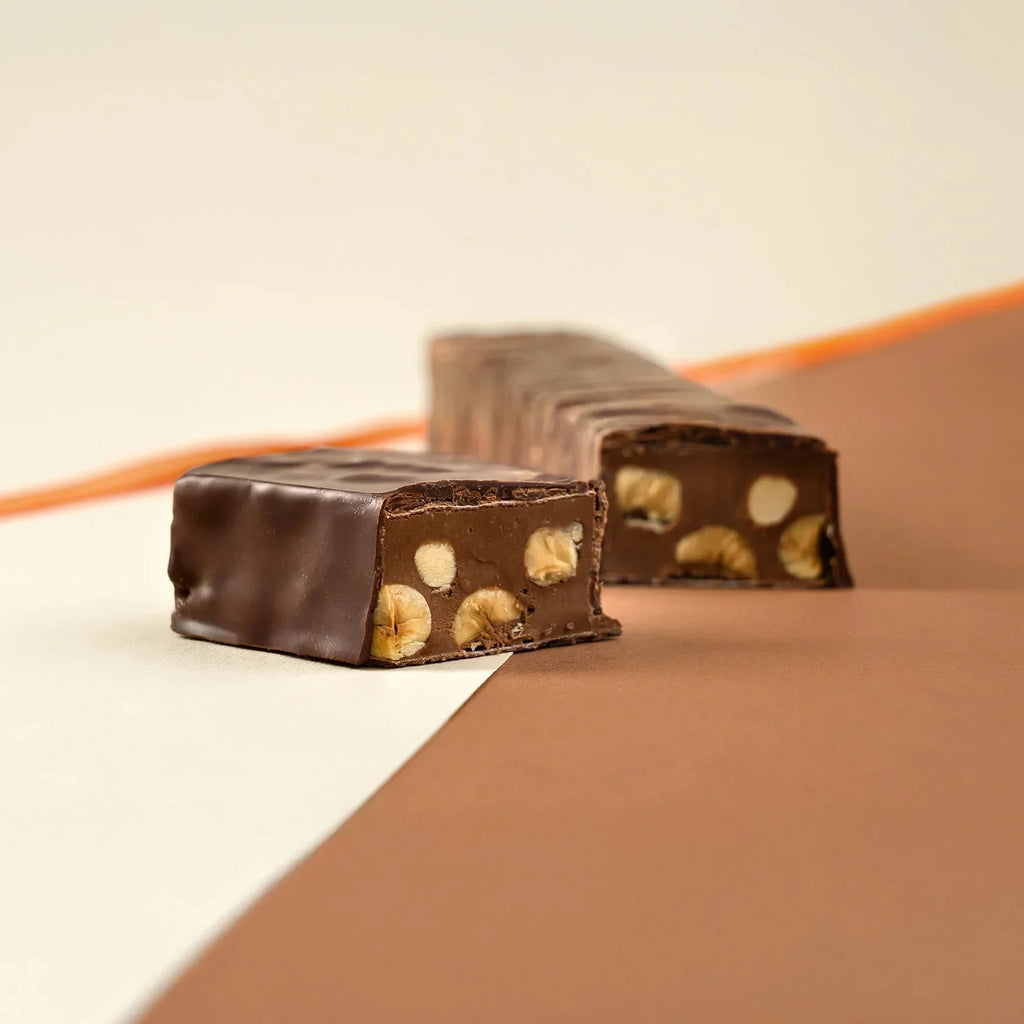 Amedei Chuao Torrone dark chocolate bar with glossy finish and whole cashews