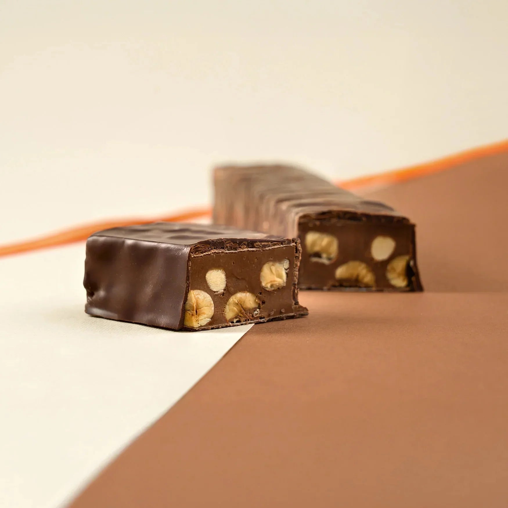 Amedei Chuao Torrone dark chocolate bar with glossy finish and whole cashews