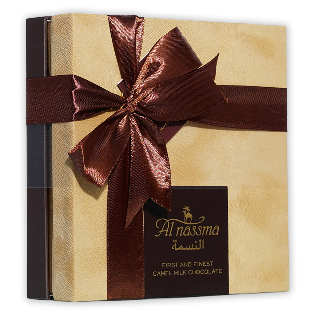 Al Nassma camel milk praline chocolate gift box, 18 pcs, gold with brown ribbon