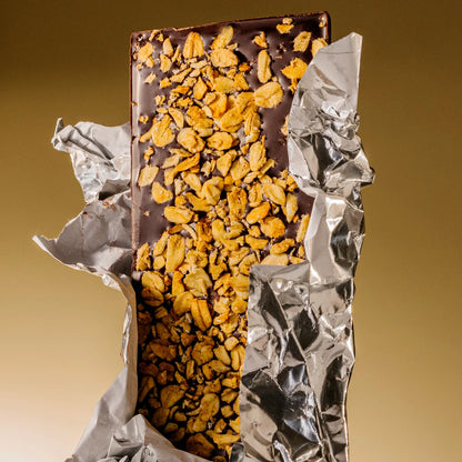 Raaka Apple Crisp 60% dark chocolate bar with golden granola topping