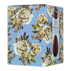Rectangular domori easter egg milk chocolate box with 38% cocoa on a light blue floral cream and green background