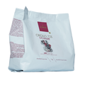 Domori Criollo 72% cocoa chocolate mass bag with maroon logo and red bird, 1kg bulk drops