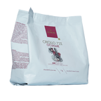 Domori Criollo 72% cocoa chocolate mass bag with maroon logo and red bird, 1kg bulk drops