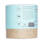 French Broad Milk Hot Chocolate Mix light blue cylindrical can with cocoa pod band