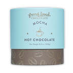 French Broad Mocha Hot Chocolate in blue-brown canister with coffee beans