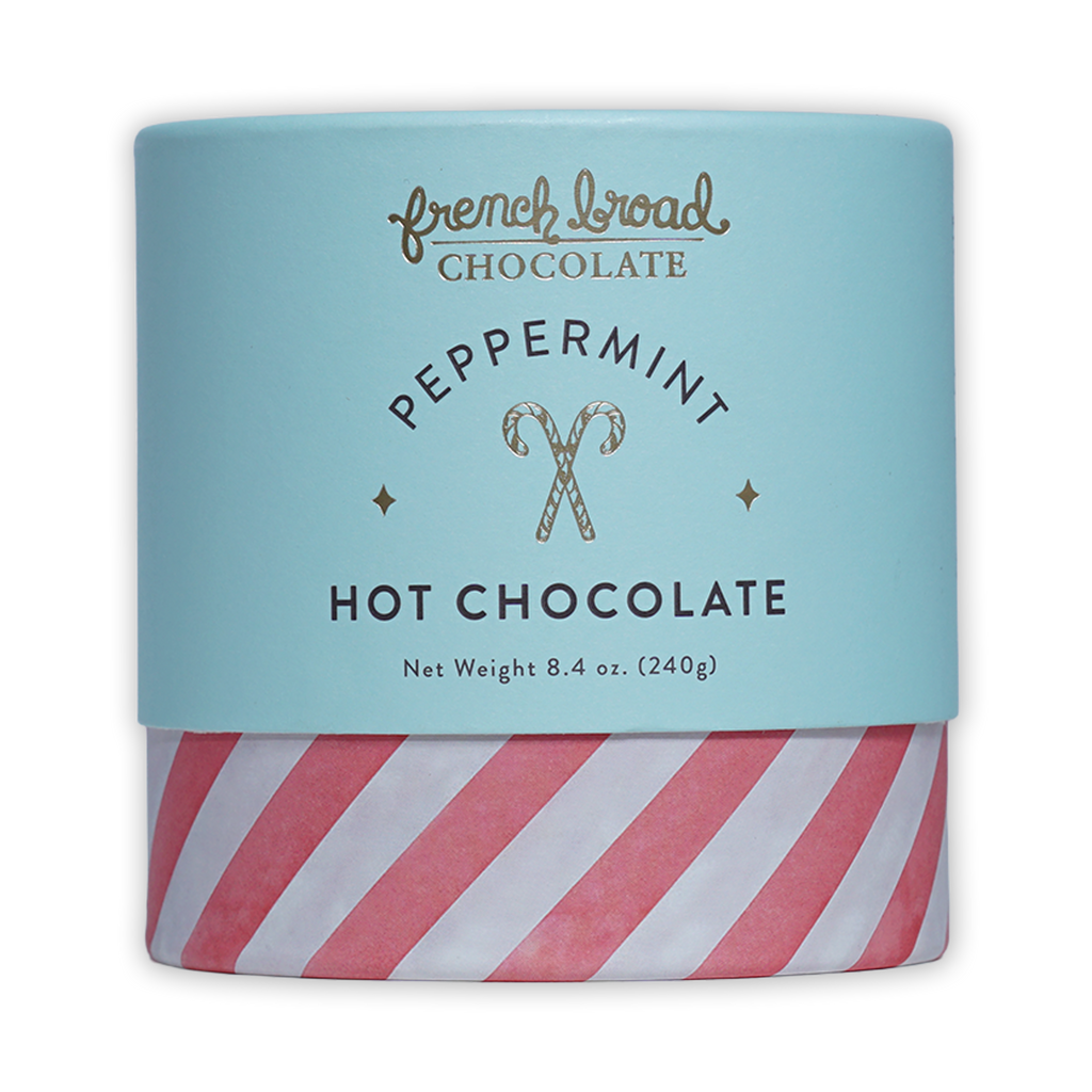 French Broad Peppermint Hot Chocolate in light blue striped canister