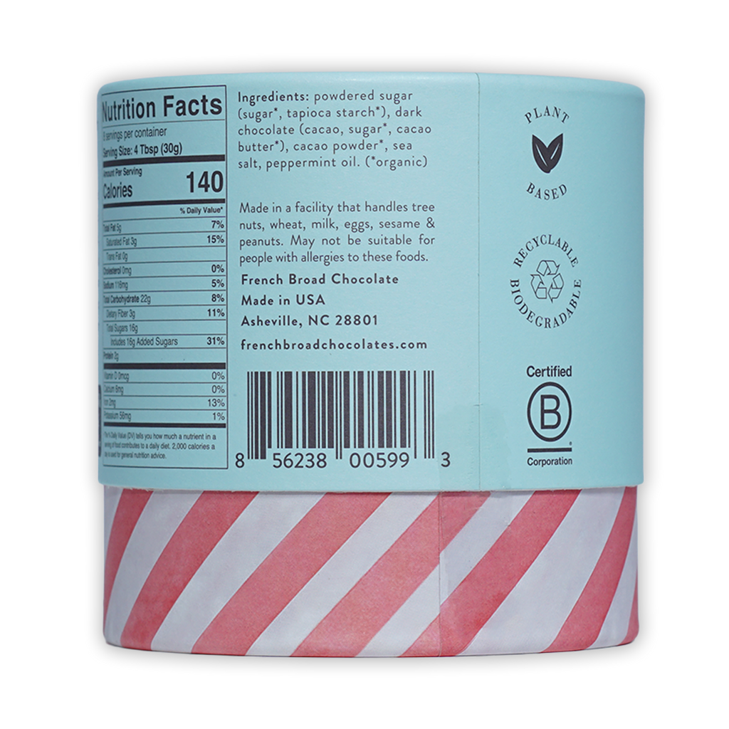 French Broad Peppermint Hot Chocolate in light blue cylinder with red white stripes