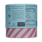 French Broad Peppermint Hot Chocolate: cylindrical can with light blue label and red-white striped base