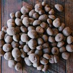 Dick Taylor chocolate coated butter toffee hazelnuts 65% with earthy brown truffles
