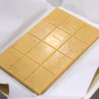 Fossa Milk Chocolate Salted Egg Cereal Blond bar with green flecks