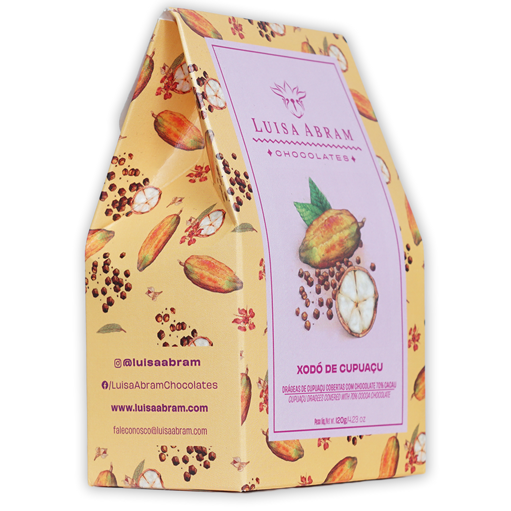 Yellow paper gift box with cocoa pod pattern, pink Luisa Abram label, cupuaçu fruit image