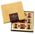 Al Nassma camel milk praline chocolate gift box with 6 gold bars