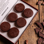 Loon Chocolate Milk Peanut Butter Cups in dark chocolate cups with red trim box
