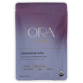 A purple and lavender stand-up pouch of Ora cacao 'Illuminating India' organic  cermonial cacao