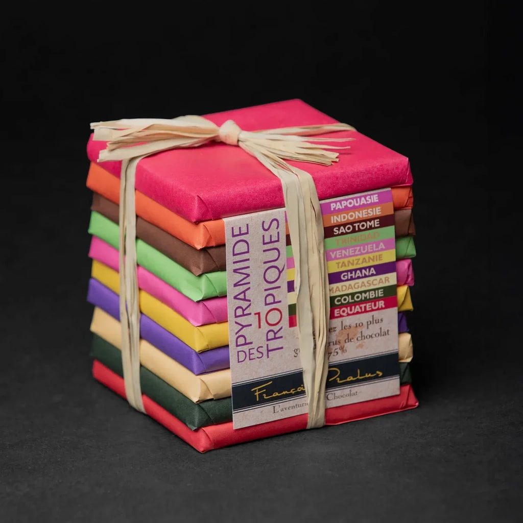 Vibrant multicolored Pralus Pyramide des Tropiques artisanal chocolate bars stack