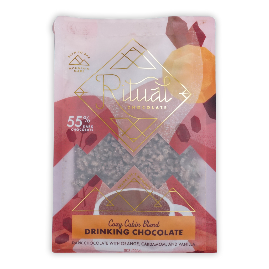Ritual drinking chocolate cozy cabin 55 percent in pink and gold foil pouch with geometric mountain design