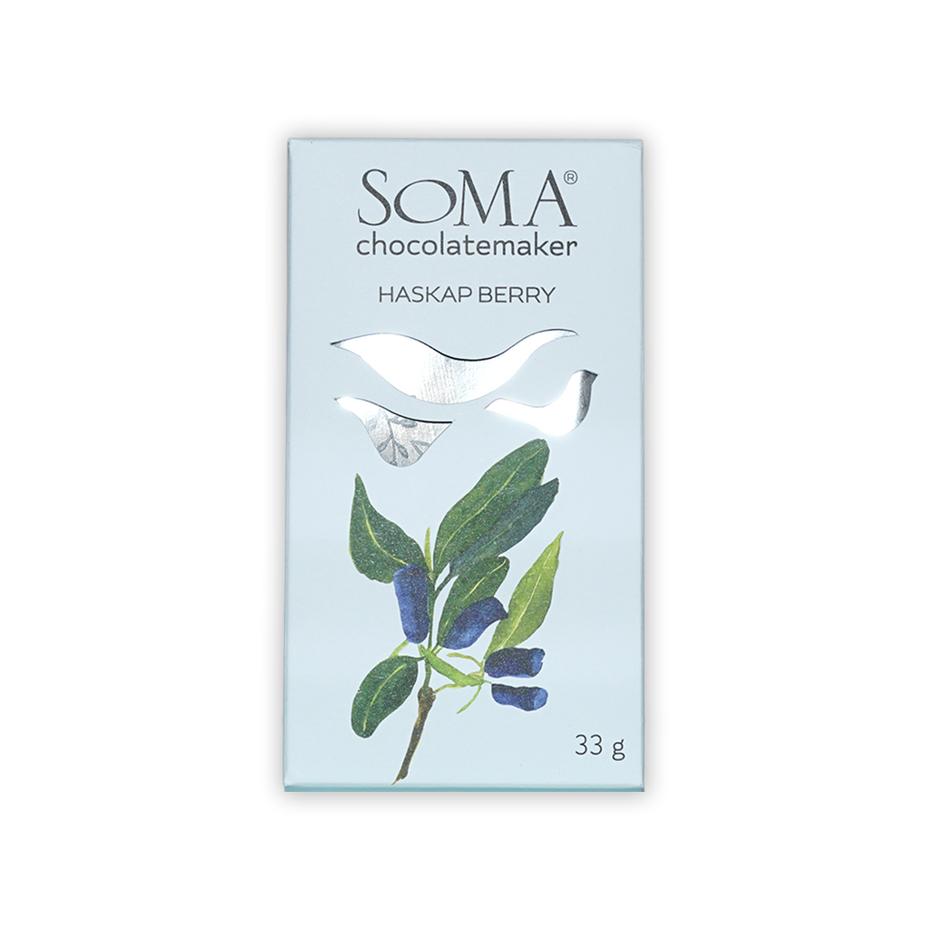 Soma Mini Haskap Berry light blue chocolate package with berry leaves illustration