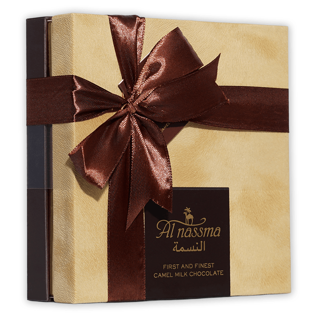 Al Nassma camel milk praline chocolate gift box, 18 pcs, gold with brown ribbon