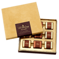 Al Nassma camel milk praline chocolate gift box with 6 gold bars