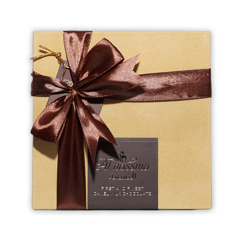 Al Nassma camel milk praline chocolate gift box 9 pcs gold with burgundy bow