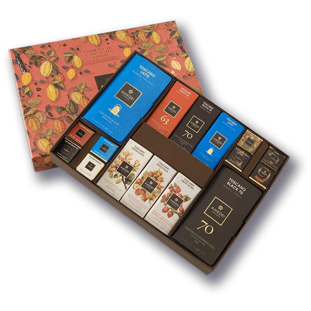 Elegant Amedei red gold cocoa pod box with assorted chocolate bars