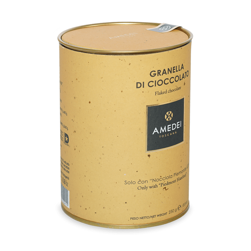 Amedei Toscana flaked chocolate golden tin with yellow speckled exterior