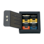 Black Amedei gift box with Madagascar 72 gold, Grenada 85 orange, Venezuela 92 blue coffee tins