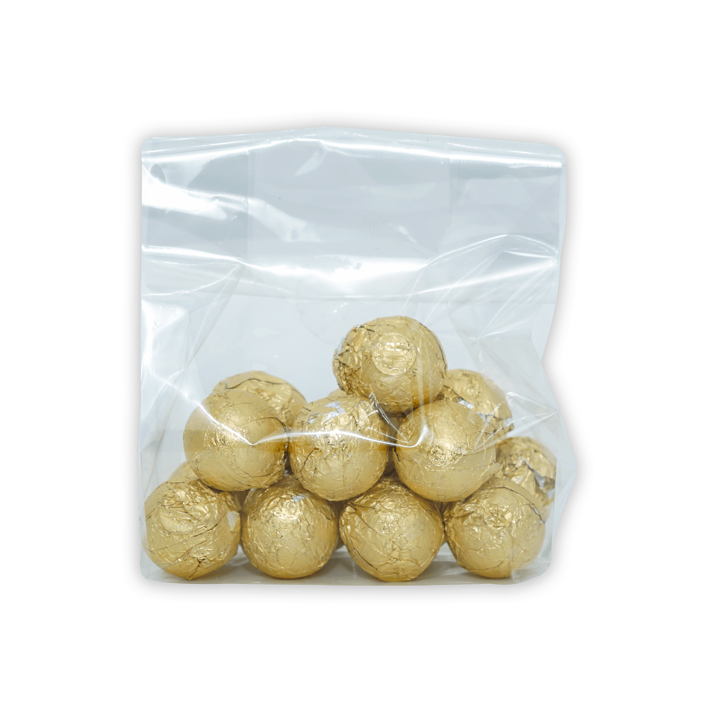 Amedei pralines white with hazelnut filling in clear bag of golden truffles
