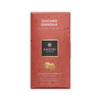 Amedei Toscano Gianduja bar in a dusty-red box with gold logo and hazelnut motif, labeled Cioccolato Gianduja, 50g.