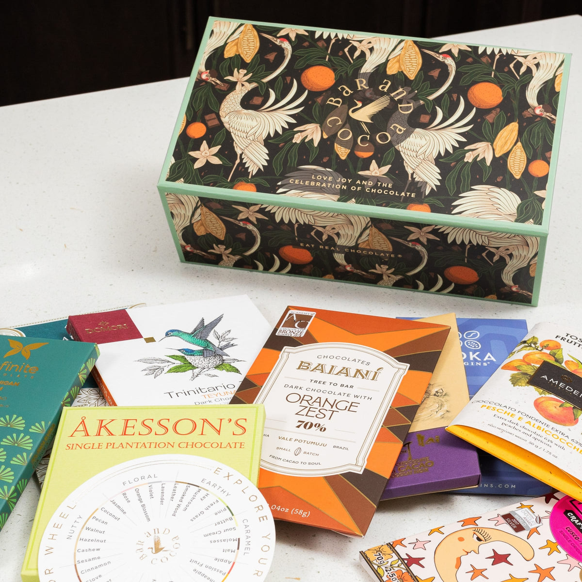 Chocolate Bars of the World gift box with dark green black pattern birds fruits cocoa pods
