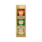 A gold Auro box reading Holiday Ornaments Set, revealing three hot chocolate bombs wrapped in red, green, and white foil.