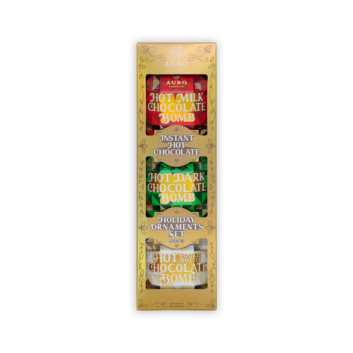 A gold Auro box reading Holiday Ornaments Set, revealing three hot chocolate bombs wrapped in red, green, and white foil.