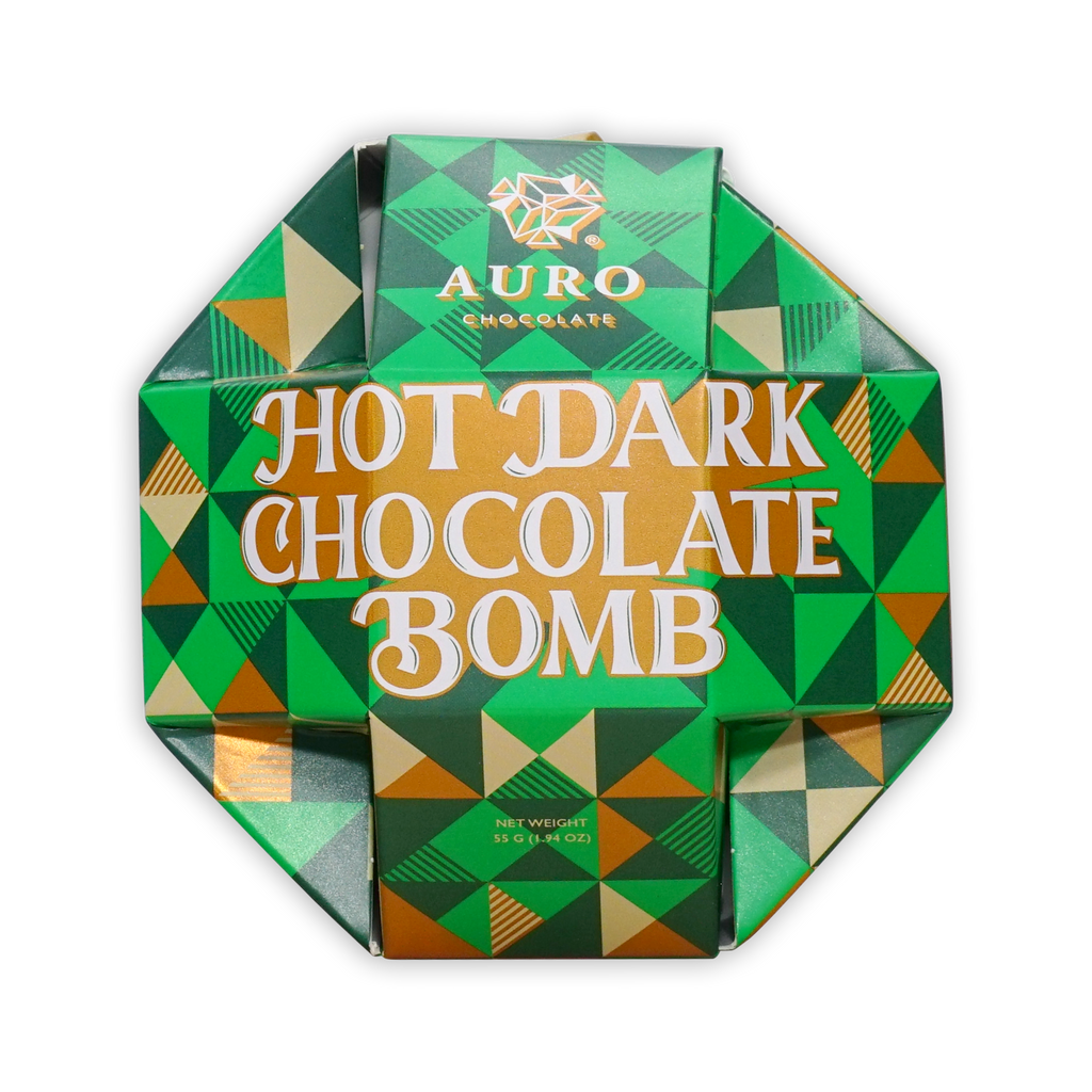 A green and gold geometric octagonal box of Auro Chocolate Hot Dark Chocolate Bomb.