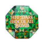 A green and gold geometric octagonal box of Auro Chocolate Hot Dark Chocolate Bomb.