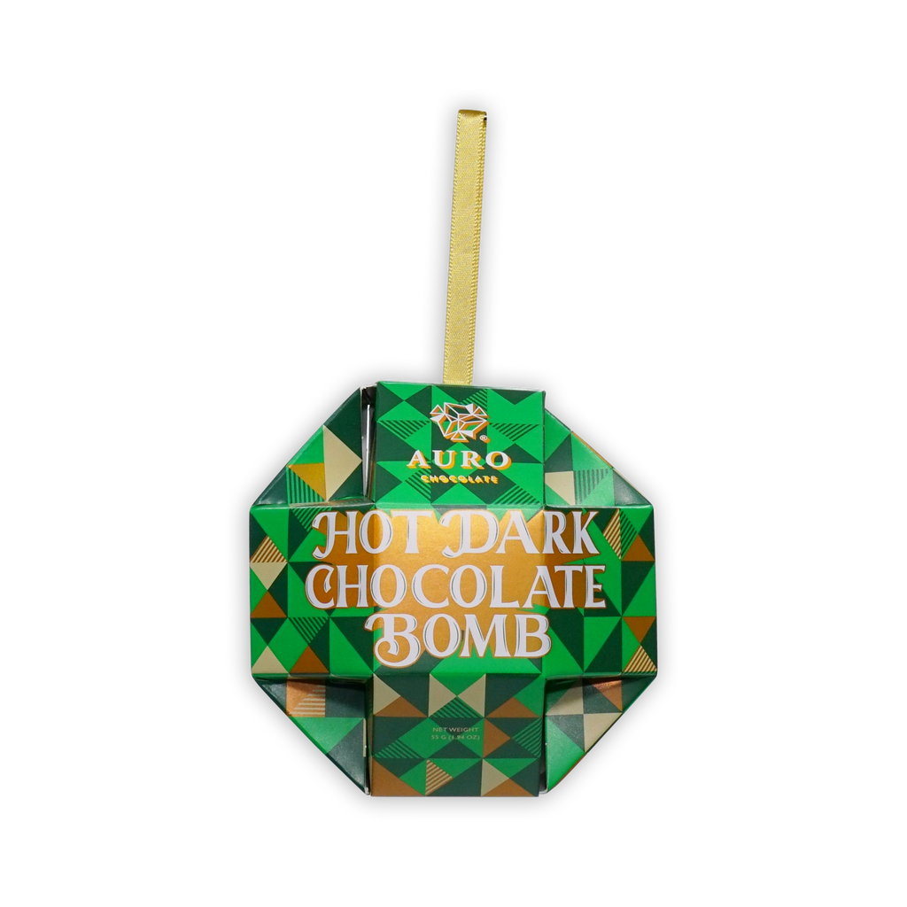 A green and gold geometric ornament box reading Auro Hot Dark Chocolate Bomb with a gold ribbon on a white background.