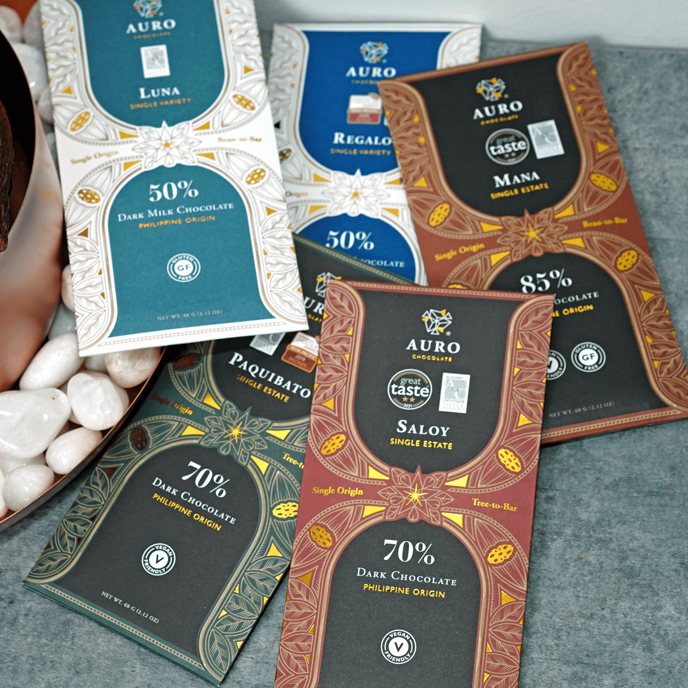 Auro Chocolate Bundles with assorted bars in elegant floral wrappers