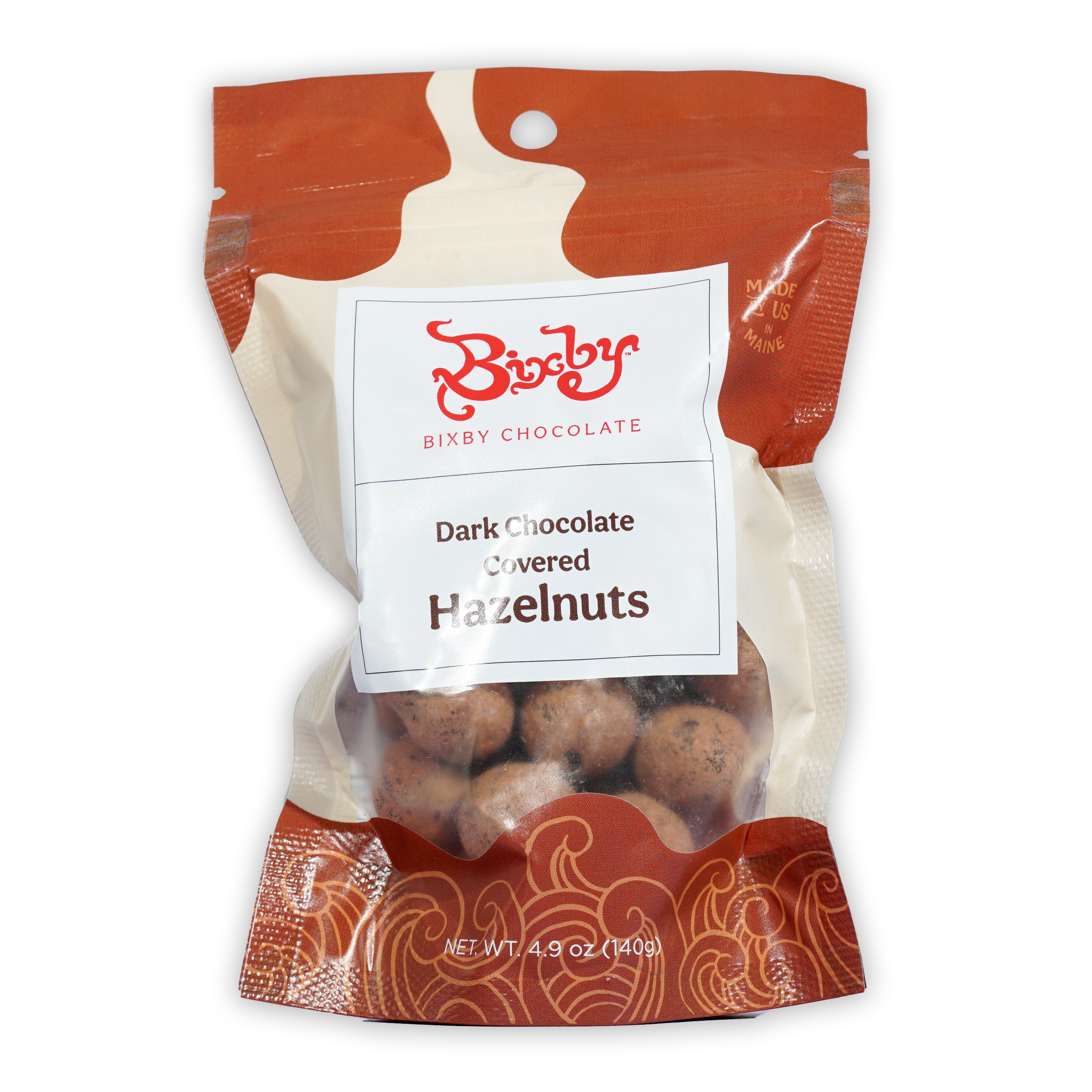 Bixby dark chocolate covered hazelnuts in red cream package with window