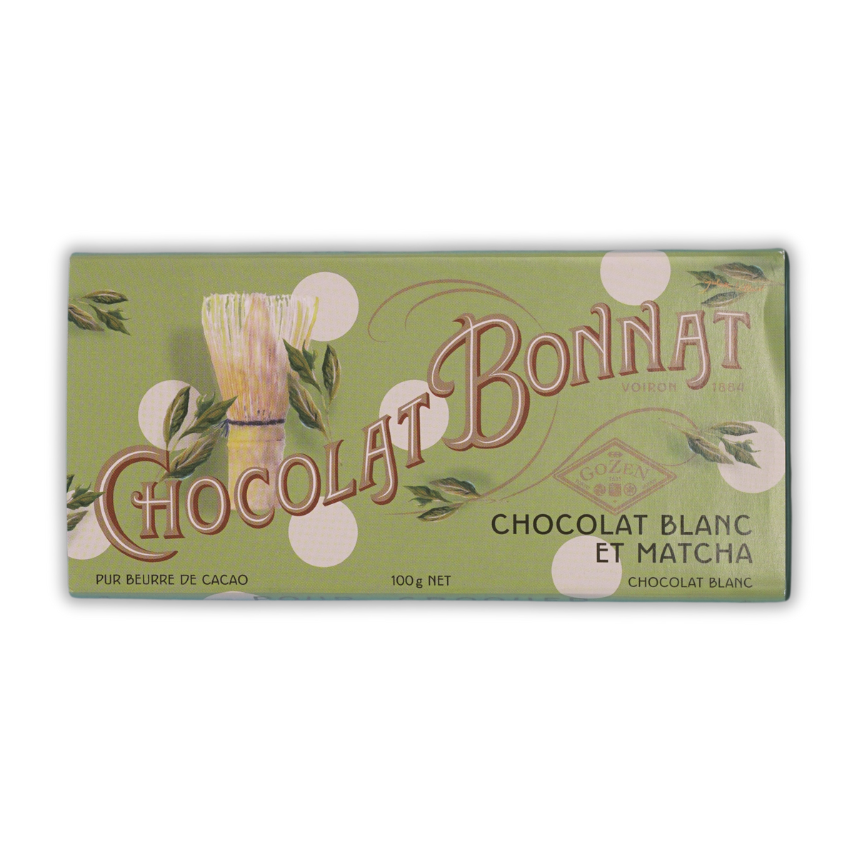 Bonnat Chocolat Blanc et Matcha bar in green packaging with a whisk illustration on a black background.