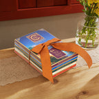 Cacaoteca bars tied with an orange ribbon.