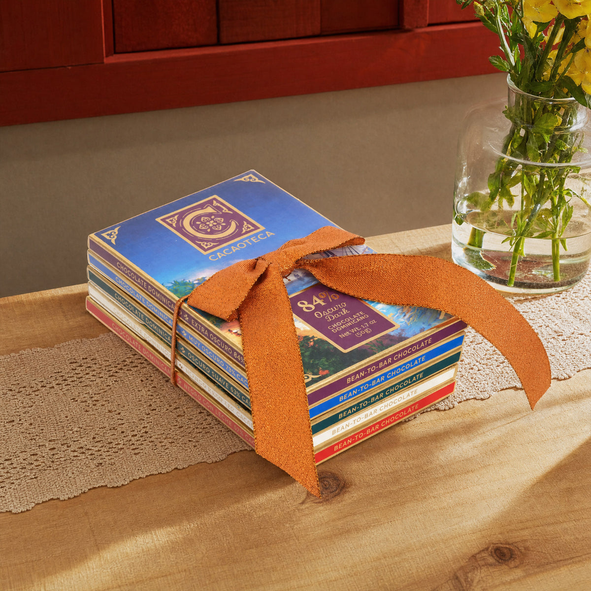 Cacaoteca bars tied with an orange ribbon.